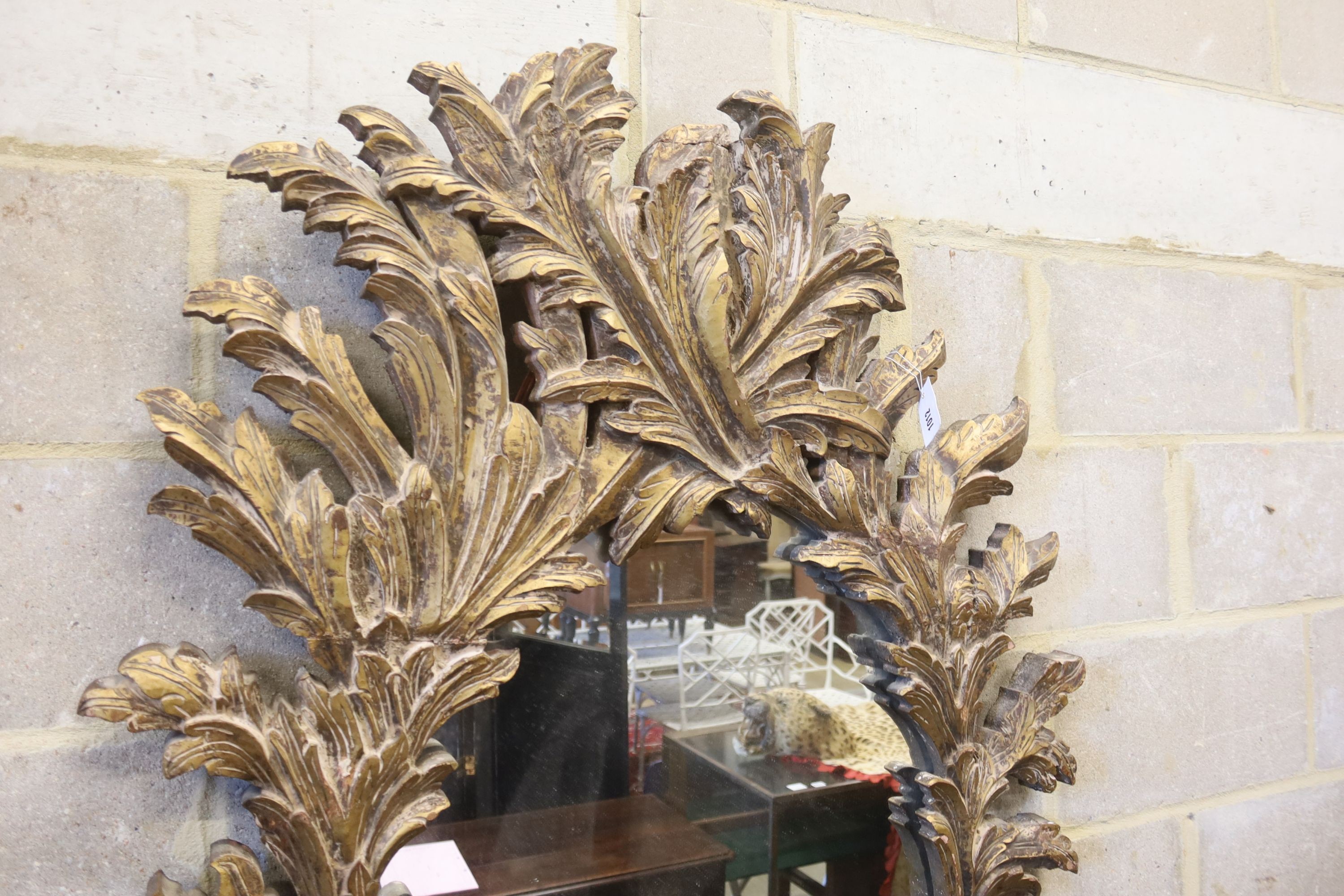 An 18th century style gilt acanthus framed wall mirror, width 100cm, height 140cm